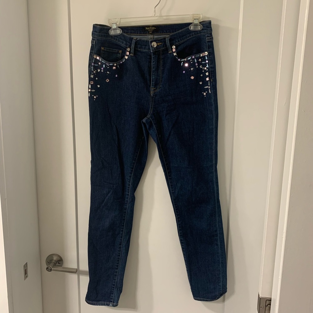 Juicy Couture medium dark wash blue jeans with embellished front pockets